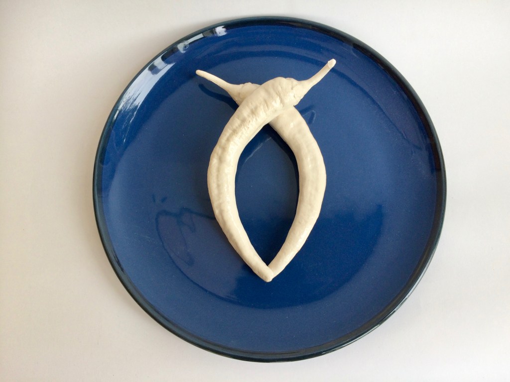 Ghost chillies on blue plate - Horn 2019